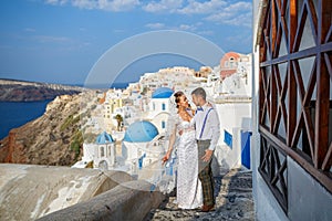 Beautiful wedding couple e on Santorini island