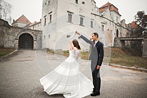 Beautiful wedding couple just married and dancing