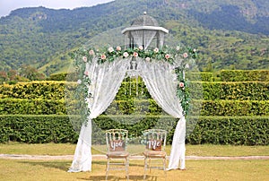 Beautiful wedding decoration with chairs you and me in the nature outdoor