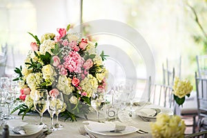Beautiful Wedding decoration on the table. Floral arrangements and decoration. Arrangement of pink and white flowers
