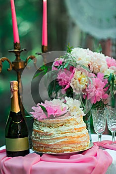 Beautiful wedding decorations champagne flowers and cake