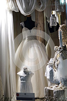 Beautiful wedding dress in a shop window, going around the city of Lefkada