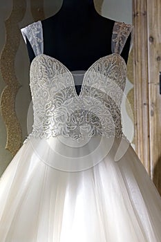 Beautiful wedding dress in a shop window, going around the city of Lefkada