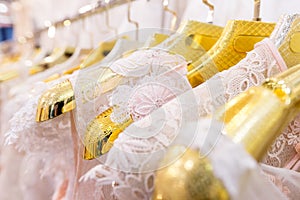 Beautiful wedding dresses on a hanger. photo