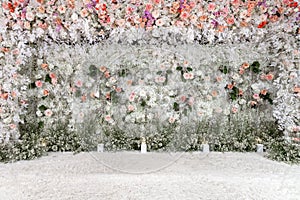 Beautiful wedding flower backdrop in wedding ceramony