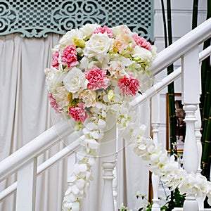 Beautiful wedding flower decoration at stairs