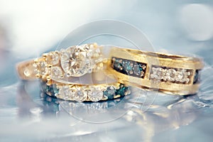 Beautiful wedding rings rose gold white and blue diamonds