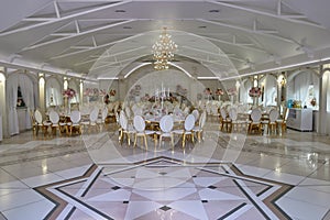 Beautiful wedding room in a white restaurant