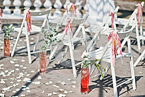 Beautiful wedding set of chairs decoration in the outdoor ceremony