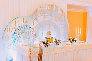 Beautiful wedding table decorated with flowers. Wedding cake. Sweets