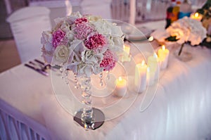 Beautiful wedding table decorations with unique floral compositions and candles