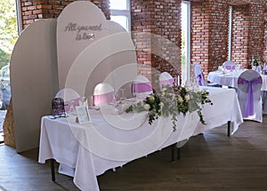 Beautiful wedding table set with purple decorations and lavender