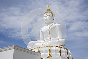 Beautiful white ancient buddha statue for thai people and foreign travelers travel visit and respect praying and blessing wish