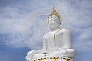 Beautiful white ancient buddha statue for thai people and foreign travelers travel visit and respect praying and blessing wish