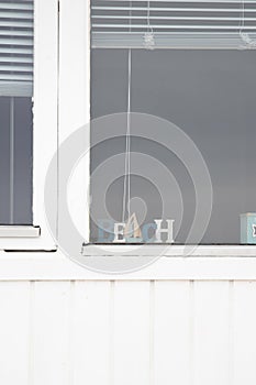 The beautiful white beach cabins at Blokhus Beach in Denmark