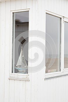 The beautiful white beach cabins at Blokhus Beach in Denmark