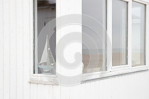 The beautiful white beach cabins at Blokhus Beach in Denmark