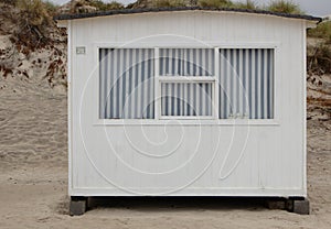 The beautiful white beach cabins at Blokhus Beach in Denmark