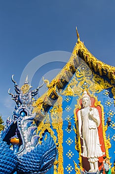 Beautiful white buddha sculpture outside the church at Wat Rong Sua Ten,ChiangRai,Thailand. Outdoor white Buddha statue at Wat Ron