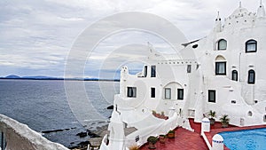 Beautiful white Casapueblo building at the shore in Punta Ballena photo