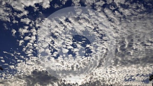 Beautiful white clouds, blue sky, the azure stratosphere, and spindrift.