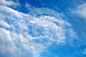 Beautiful white clouds, cumulonimbus, cumulus, rain clouds in a blue sky. Picturesque, fantastic white clouds. Plain