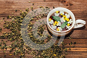 A beautiful white cup with a gold border decorated with flowers, herbal green healthy tea. Business account design.