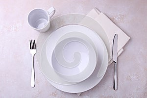 Beautiful white dishes and cutlery