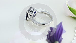 Beautiful White Gold Blue Diamond Ring paved with stones