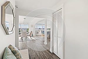 Beautiful white hallway interior with grey hardwood floors