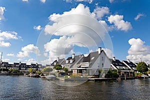 Beautiful white houses on the Dieperpoelkade in Warmond