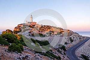 Beautiful white Lighthouse at Cape Formentor in the Coast of North Mallorca, Spain Balearic Islands Artistic sunrise and