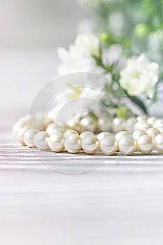 Beautiful white pearl necklace with white flowers