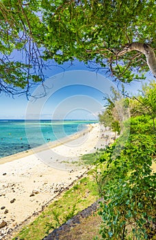 Beautiful white sand beach with turquoise blue water called Trou D`eau - Tourist place in La Saline - Reunion Island