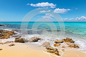 Beautiful white sand beach and turquoise sea in St Maarten, Caribbean.