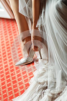 Beautiful white shoes from bride photo