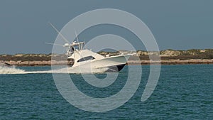 Beautiful White Sport Fishing Yacht on water