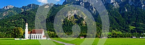 Beautiful white St. Coloman pilgrimage church, located near famous Neuschwanstein castle, Germany.