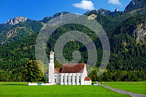 Beautiful white St. Coloman pilgrimage church, located near famous Neuschwanstein castle, Germany.