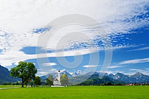 Beautiful white St. Coloman pilgrimage church, located near famous Neuschwanstein castle, Germany.