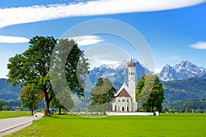 Beautiful white St. Coloman pilgrimage church, located near famous Neuschwanstein castle, Germany.