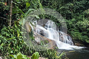 Beautiful White Stone`s Waterfall in Paraty, Brazil photo