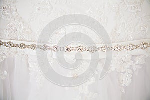 A beautiful white wedding dress closeup shot