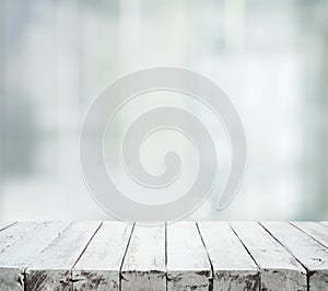 Beautiful white wooden texture table on red bokeh background.
