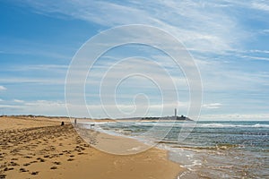 Beautiful wide shot of a sandy beach in zahora spain with a clear blue sky in the background photo