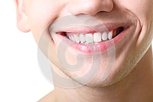 Beautiful wide smile of young man with great healthy white teeth