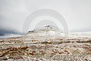 Beautiful wild nature of Kasivrasi Wilderness area in Finland Lapland with snow capped mountain peak.