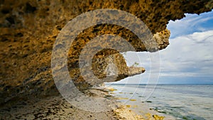 Beautiful wild tropical beach near Anda with granite rocks. Bohol Island. Philippines.