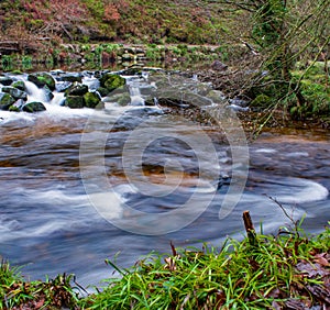 Beautiful winding river, situated at Fingle bridge in Dartmoor national park. Taken with a long exposure