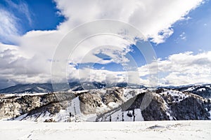 winter landscape with the Bucegi Mountains in Romania